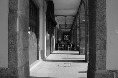 People walking on street amidst buildings