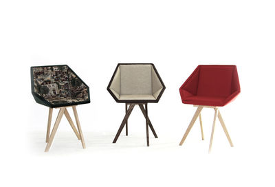 Deck chairs against white wall