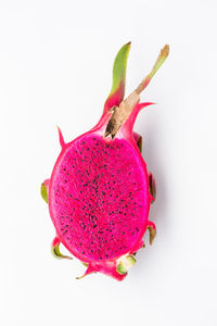 Close-up of strawberry over white background