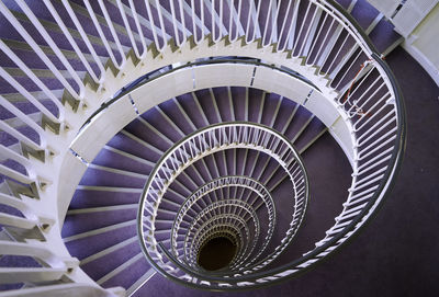 High angle view of empty spiral staircase in building