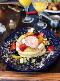 Close-up of fruits served on table