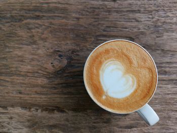 Directly above shot of cappuccino on table