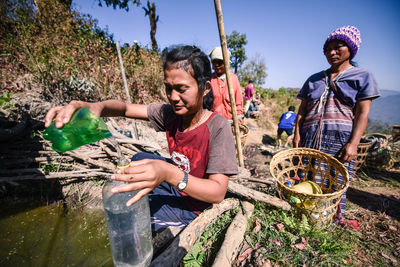 Young couple sitting in basket