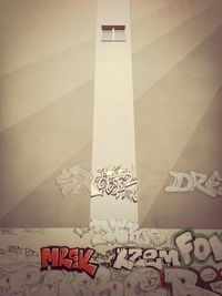 Close-up of text on wall
