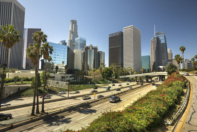 Panoramic view of city buildings against sky