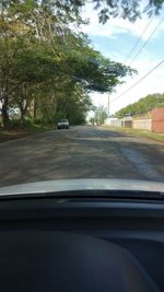 Road passing through forest