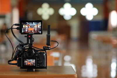 Close-up of camera on table