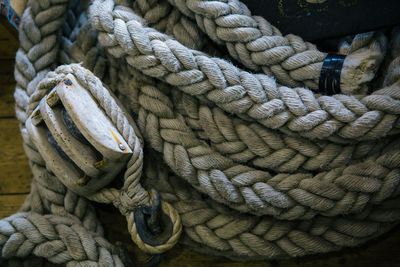Close-up of coiled up rope in boat