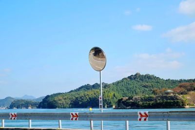 Scenic view of sea against blue sky