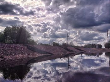 View of river against cloudy sky