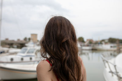 Rear view of woman looking at sea