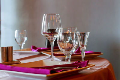 Close-up of wineglasses on table in restaurant