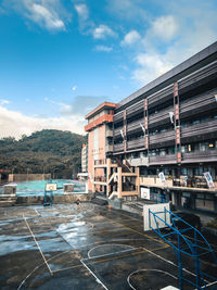 Buildings in city against sky