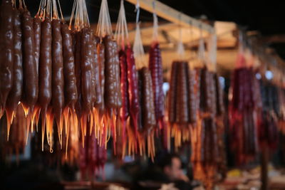 Close-up of sausage hanging for sale