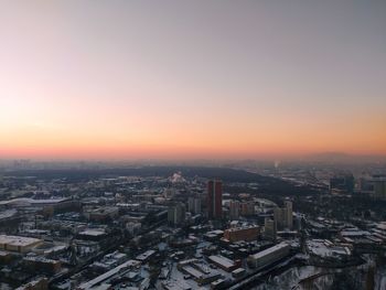 High angle view of townscape against sky during sunset