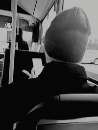 Close-up of woman sitting in bus