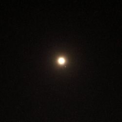 Scenic view of moon against sky at night