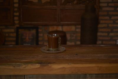 Close-up of coffee cup on table