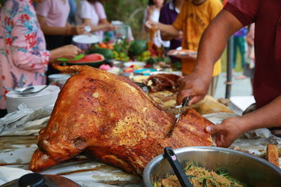 Man preparing food on table