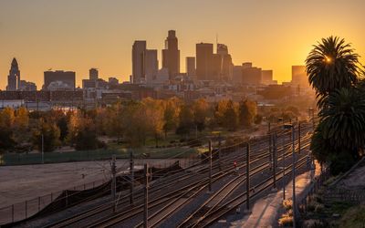 High angle view of railroad track against sky during sunset