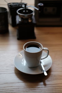 Coffee cup on table