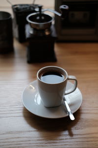 Coffee cup on table