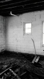 Abandoned building seen through window