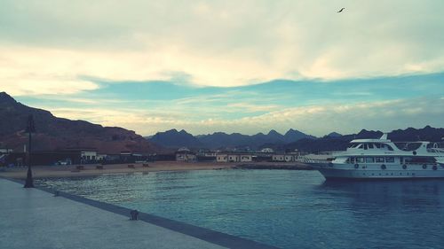 Scenic view of sea against cloudy sky