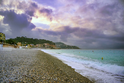 Scenic view of beach against sky