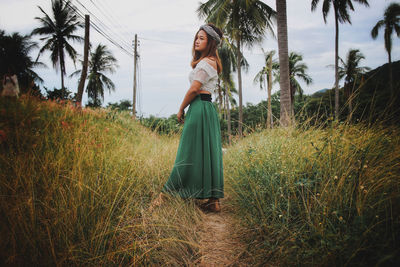 Woman walking on field