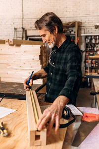 Man working on wood