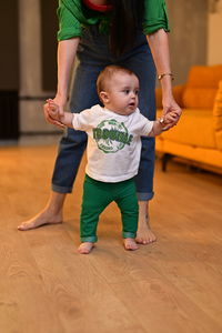 High angle view of boy playing with toys