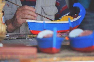 Close-up of hands working