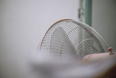 Close-up of hand holding umbrella at home