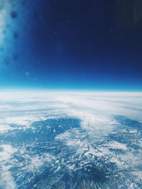 Aerial view of cloudscape against blue sky