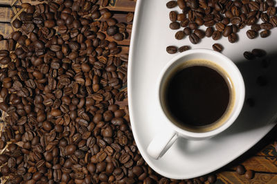 Directly above shot of coffee cup on table