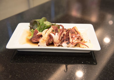 Close-up of food served in plate on table