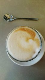 Close-up of coffee cup on table