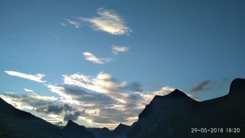 Low angle view of silhouette mountain against sky