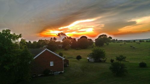 Scenic view of landscape at sunset