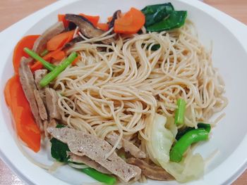 Close-up of noodles served in plate on table