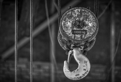 Close-up of chain hanging on rope