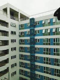 Low angle view of modern building against clear sky