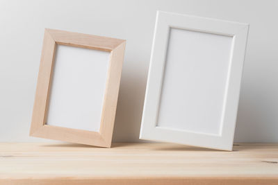 Low angle view of empty table against wall at home