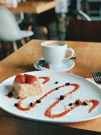 Close-up of coffee cup on table