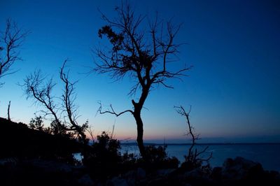 Scenic view of calm sea at sunset