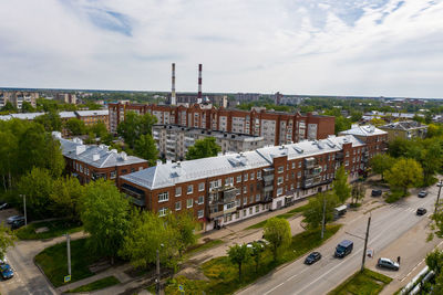 High angle view of street amidst buildings in city