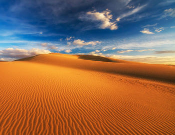 Scenic view of desert against sky