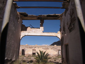 Low angle view of old building against clear sky