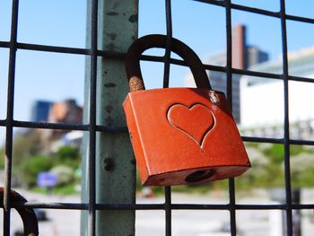 Close-up of padlocks on fence